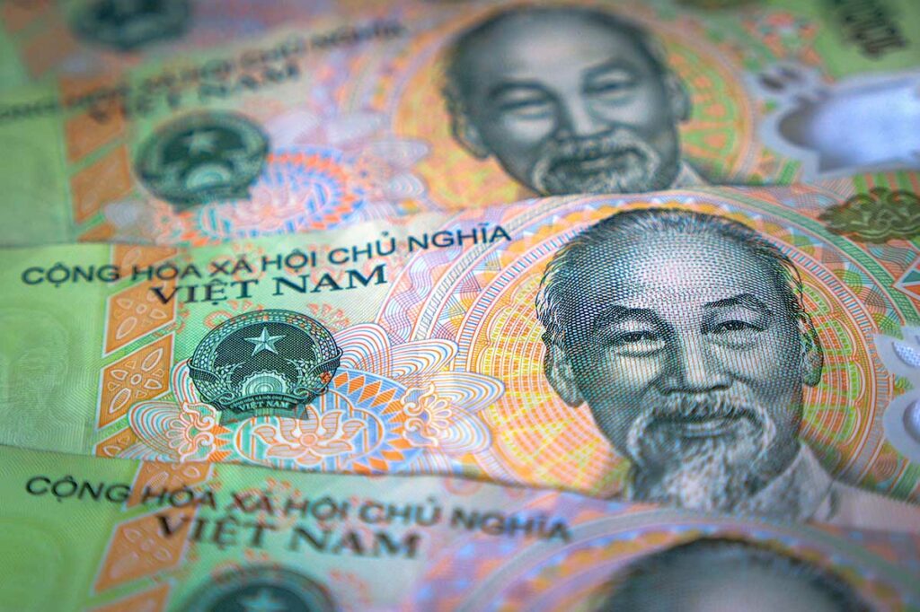 Vietnamees papiergeld met het portret van Ho Chi Minh, dat op alle bankbiljetten in omloop staat en zijn blijvende rol in de nationale identiteit weerspiegelt.